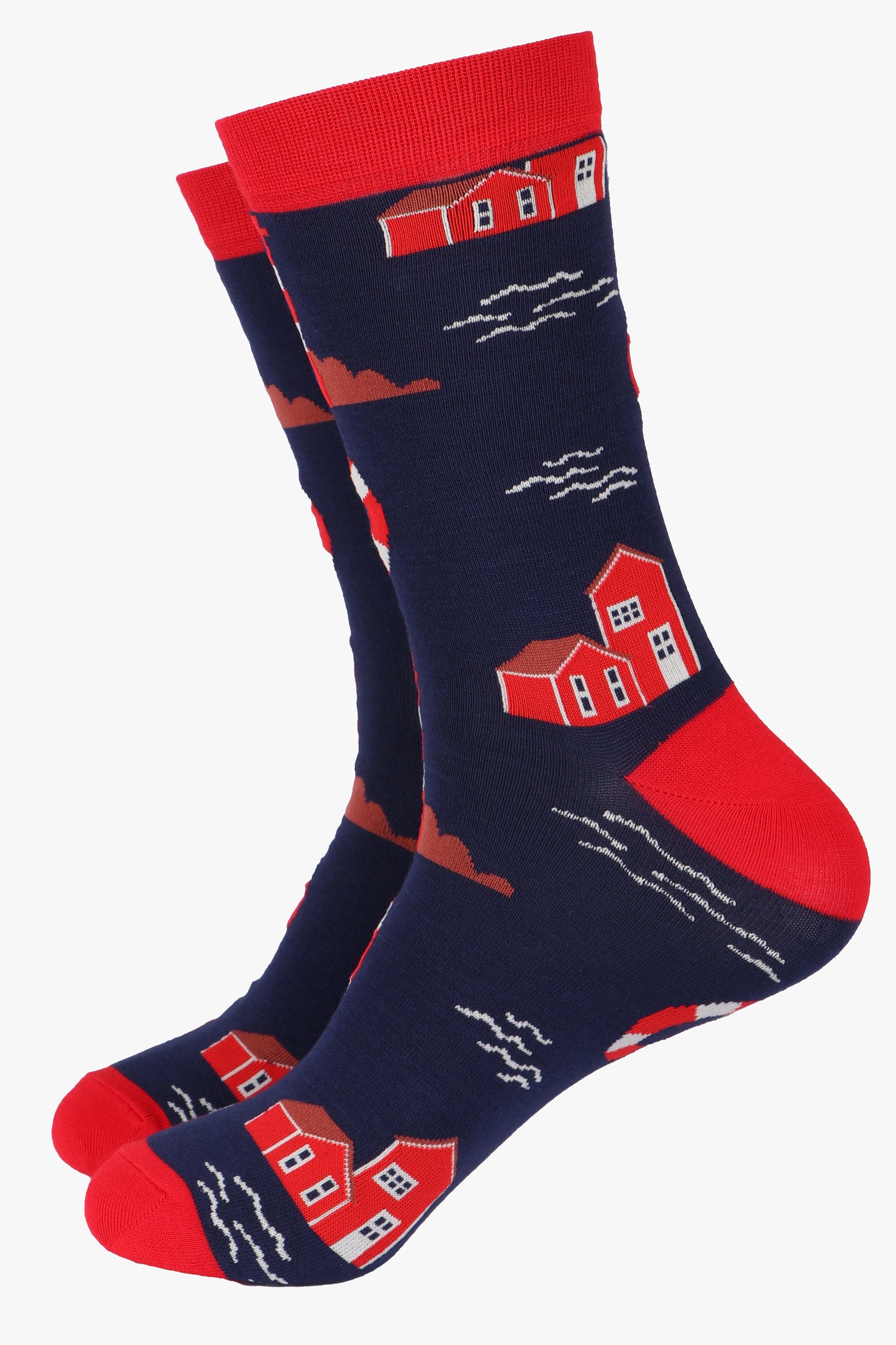 navy blue socks with a red heel, toe and cuff with a pattern of lighthouses and lifebuoys