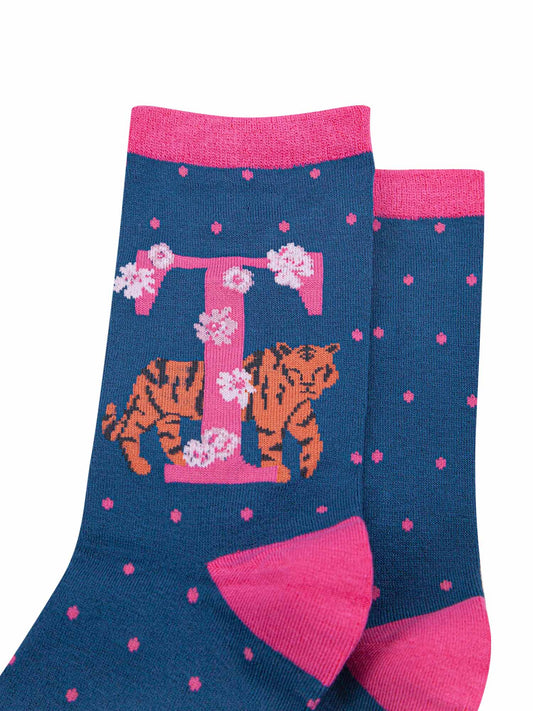 blue, pink ankle socks with a letter T and a tiger