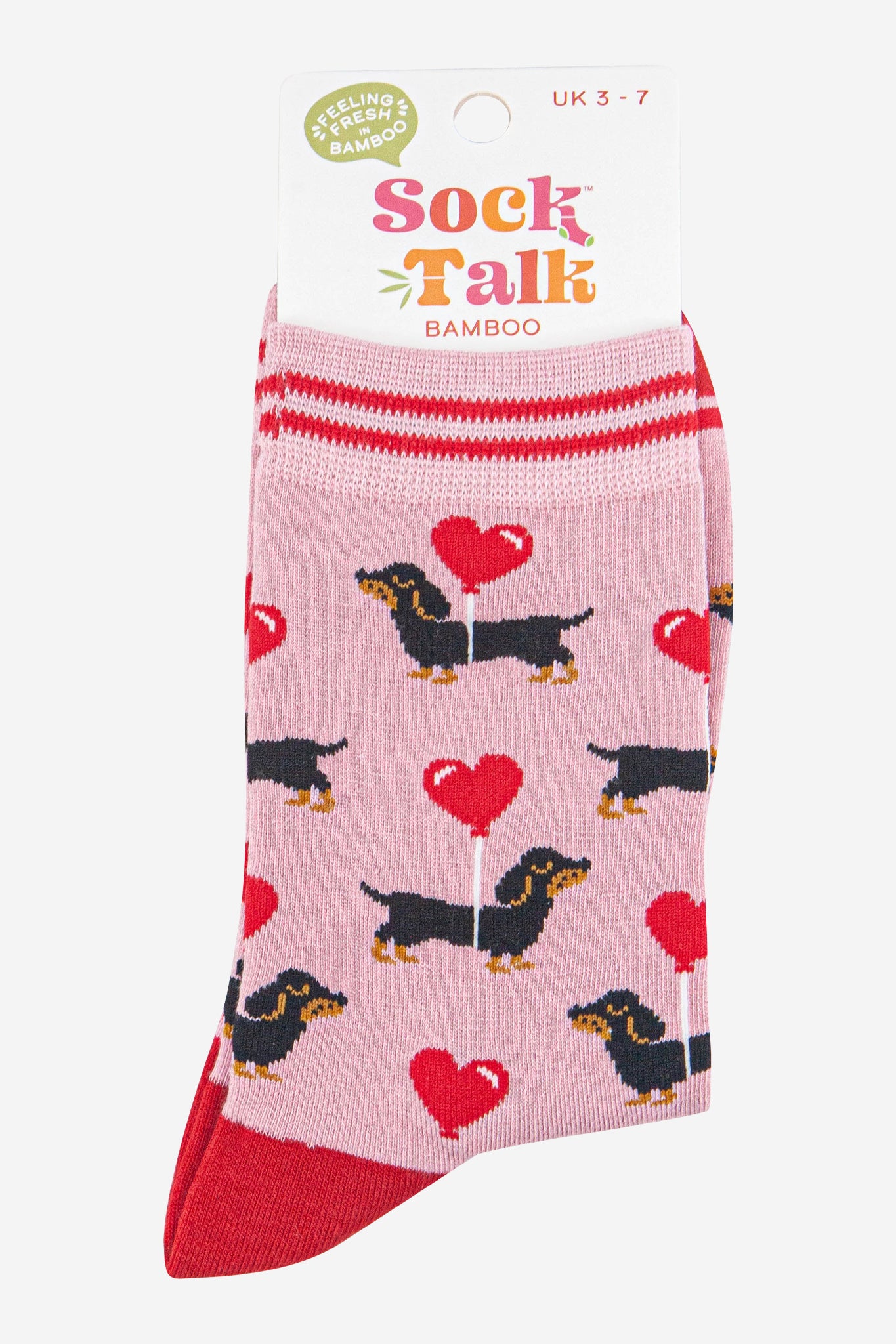 womens-bamboo-socks-light-pink-red-sausage-dogs-in-sock-talk-packaging