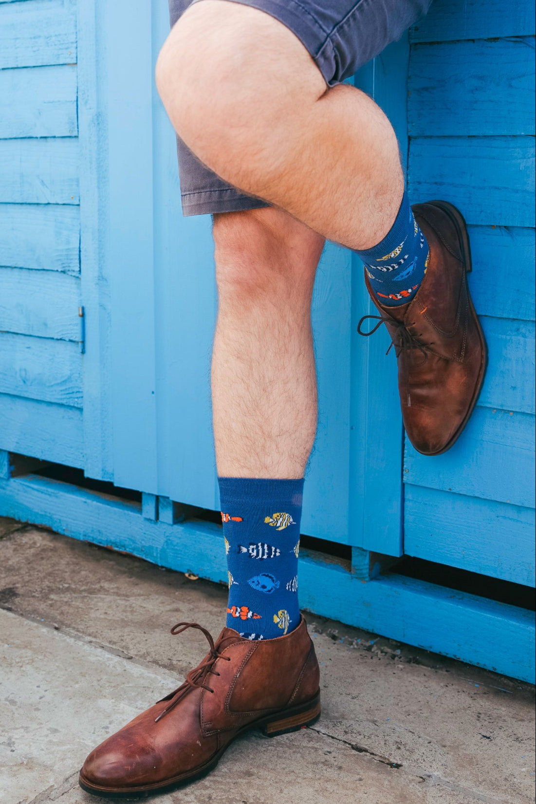 mens-tropical-fish-print-bamboo-socks-styled-with-brown-loafer-suit-shoe
