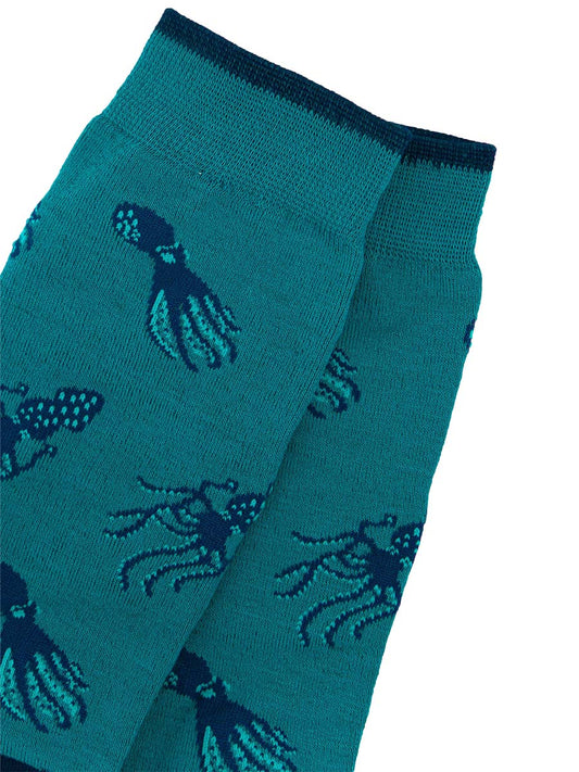 close up of the navy blue squid and octopus pattern on the bamboo socks
