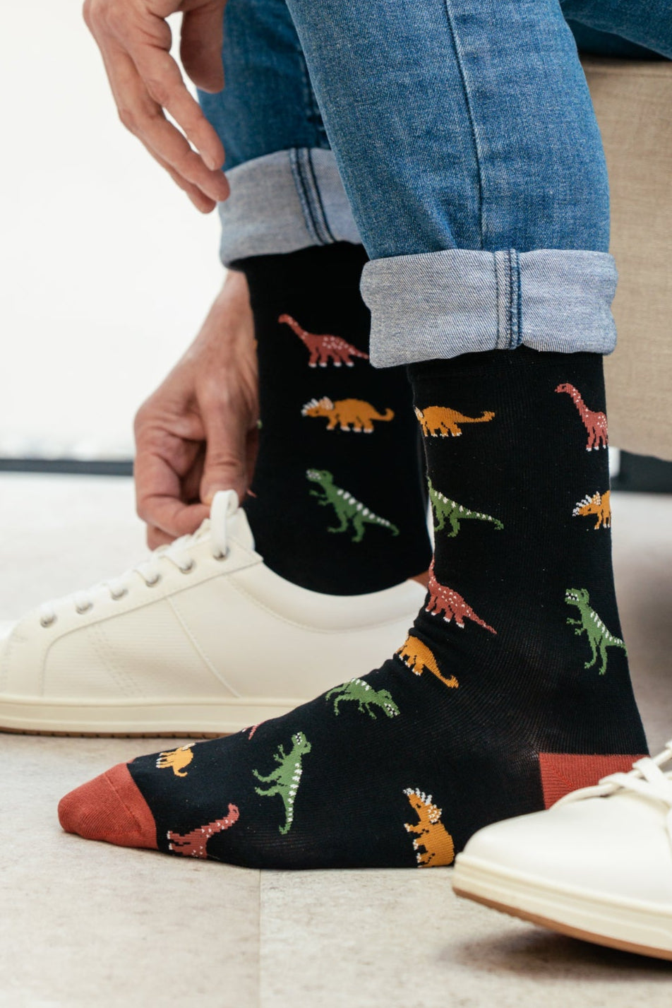 mens-assorted-dinosaur-print-bamboo-socks-styled-with-white-trainers