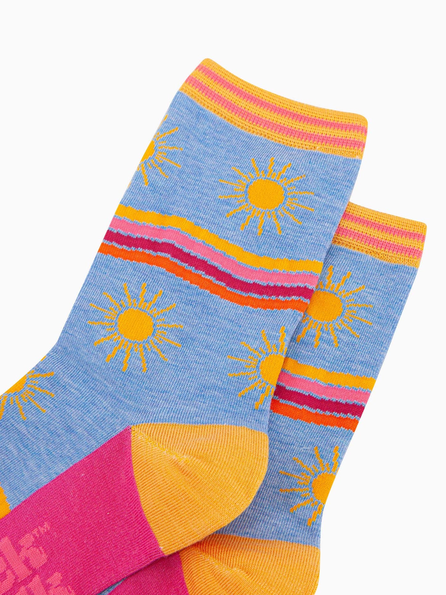 womens-bamboo-socks-blue-sunshine-wavy-stripes-close-up-large-yellow-suns-rainbow-wavy-stripes-in-yellow-pink-fuchsia-orange