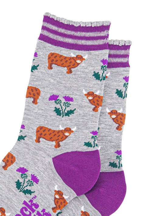 womens-bamboo-socks-light-grey-purple-highland-cow-thistles-close-up