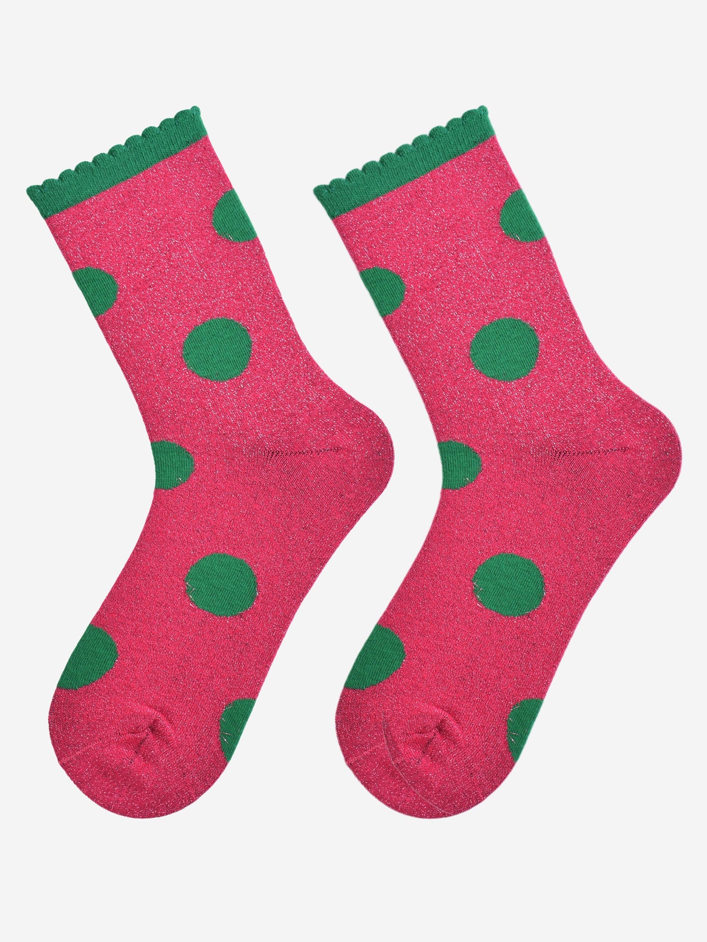 hot pink and green large polka dot pattern glitter socks laying flat, showing the all over glitter sparkle