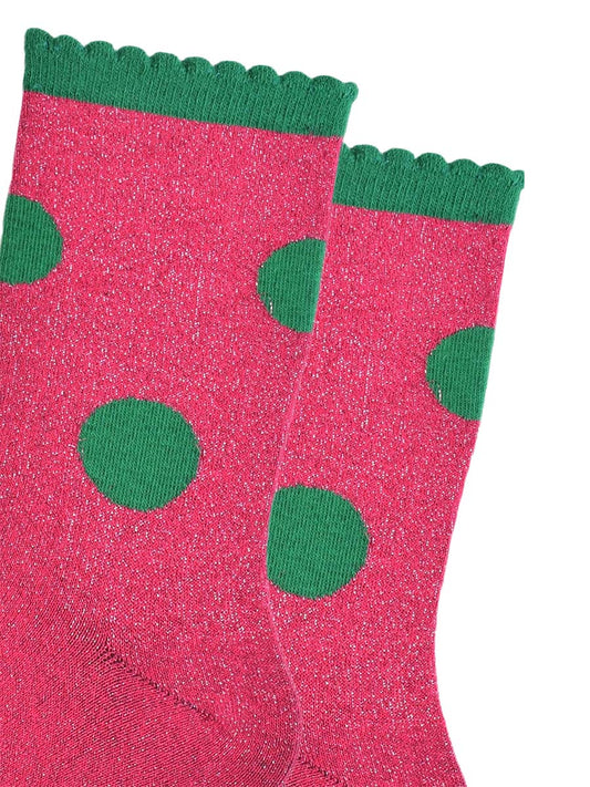 close up of the silver glitter sparkle of the ankle socks, also showing clearly the scalloped cuff
