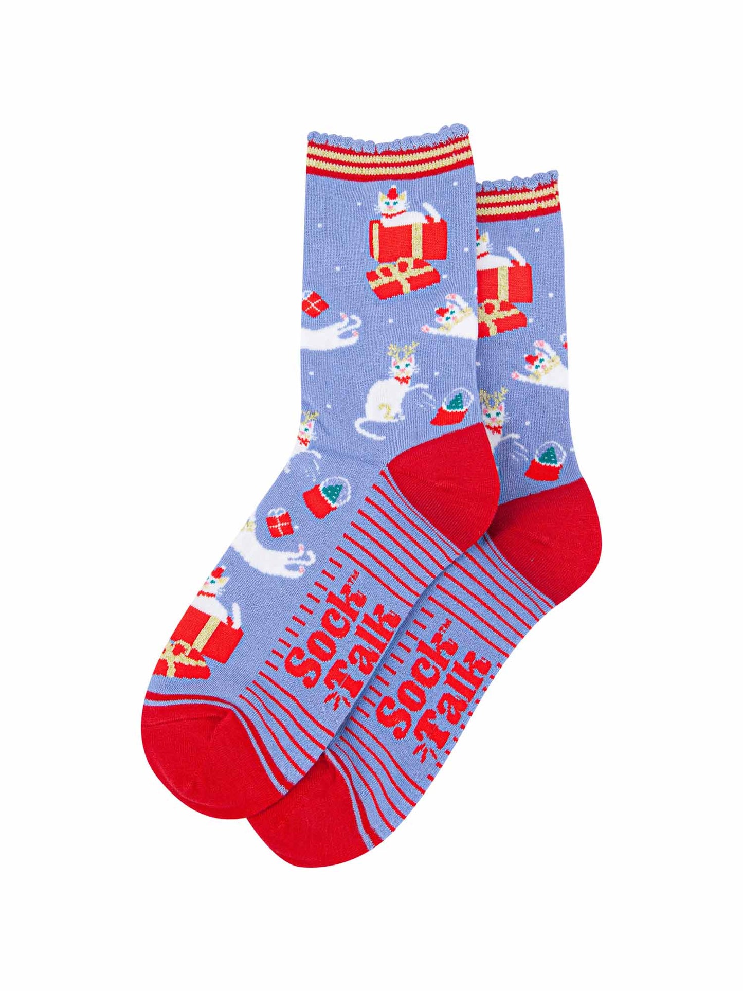 showing the christmas cat socks laying flat, the sole has a red striped pattern and the socks have an all over pattern of white cats playing with snow globes and xmas gifts