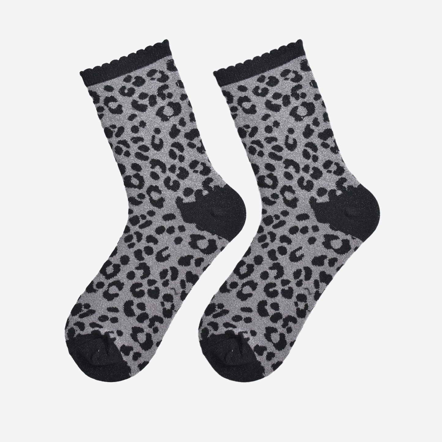 showing the grey and black leopard print glitter socks laying flat, the all over glitter sparkle is visible