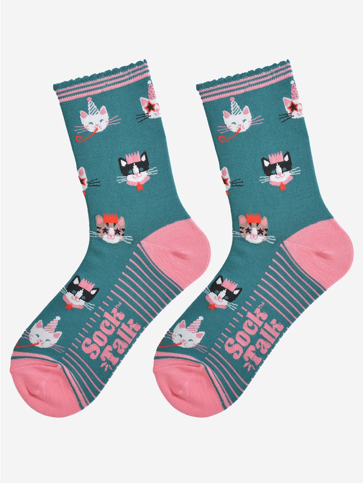 showing the green party cat socks laying flat, the sole has pink stripes and the cat face pattern is all over the socks.