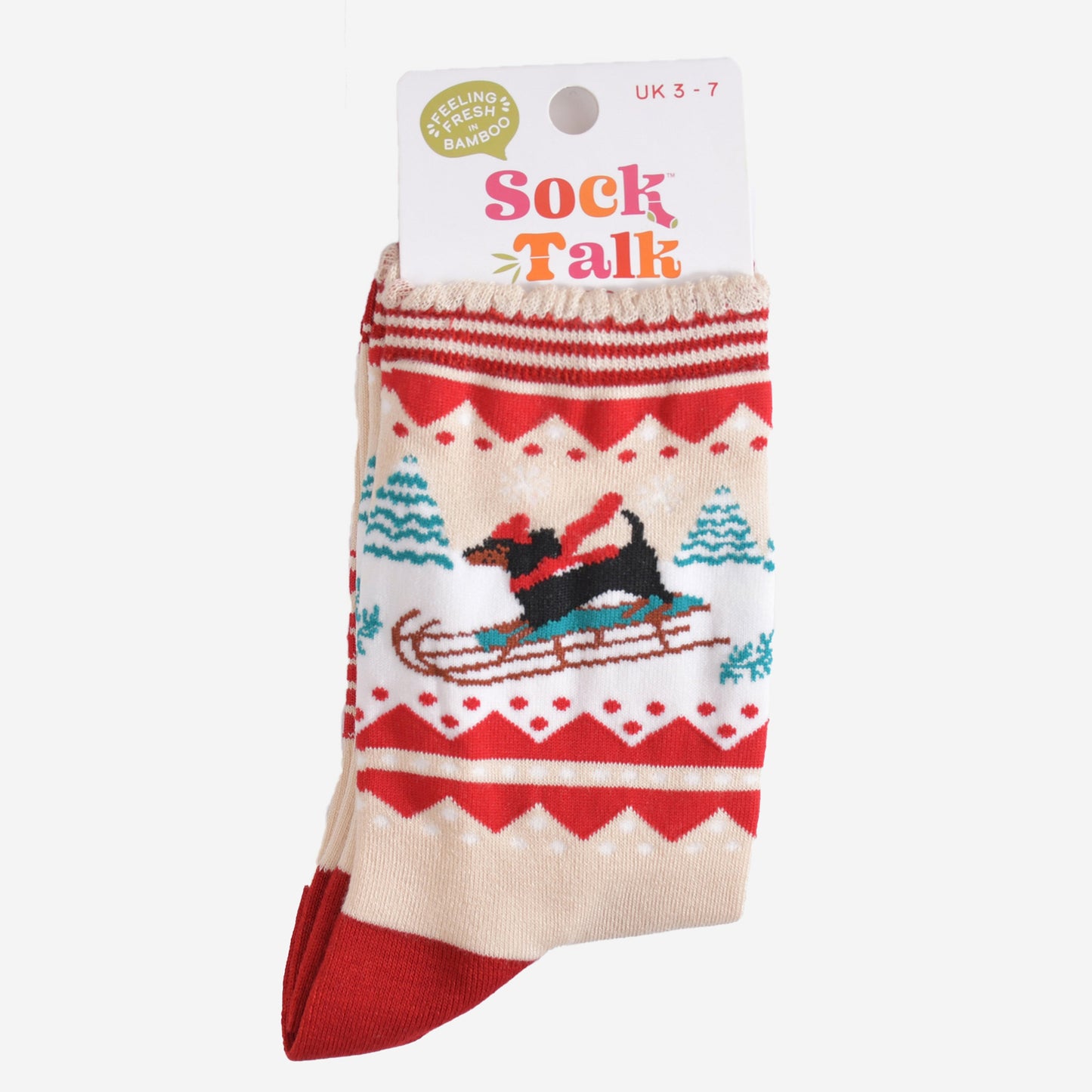 sledging sausage dog bamboo socks in their sock talk packaging, these socks are a uk size 3-7