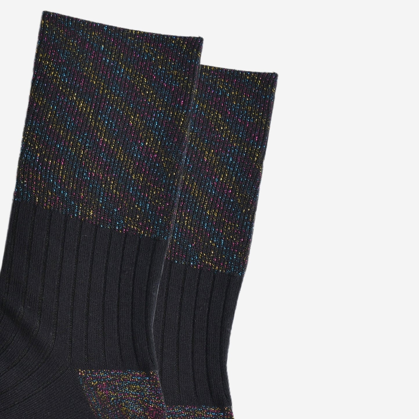 close up of the black rainbow glitter folding cuff on the black cotton socks. showing an all over rainbow sparkle