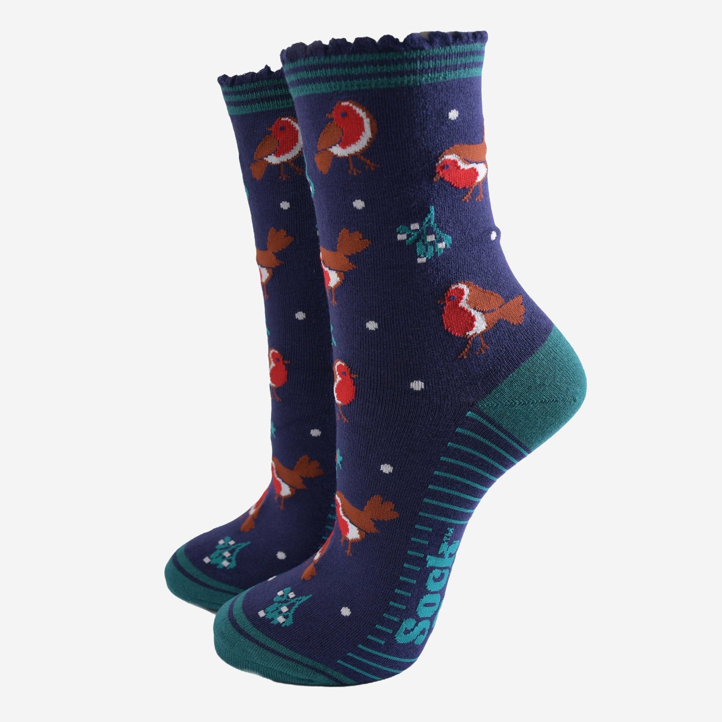 navy blue socks with a green striped cuff with a pattern of red robin birds, mistletoe and holly all over