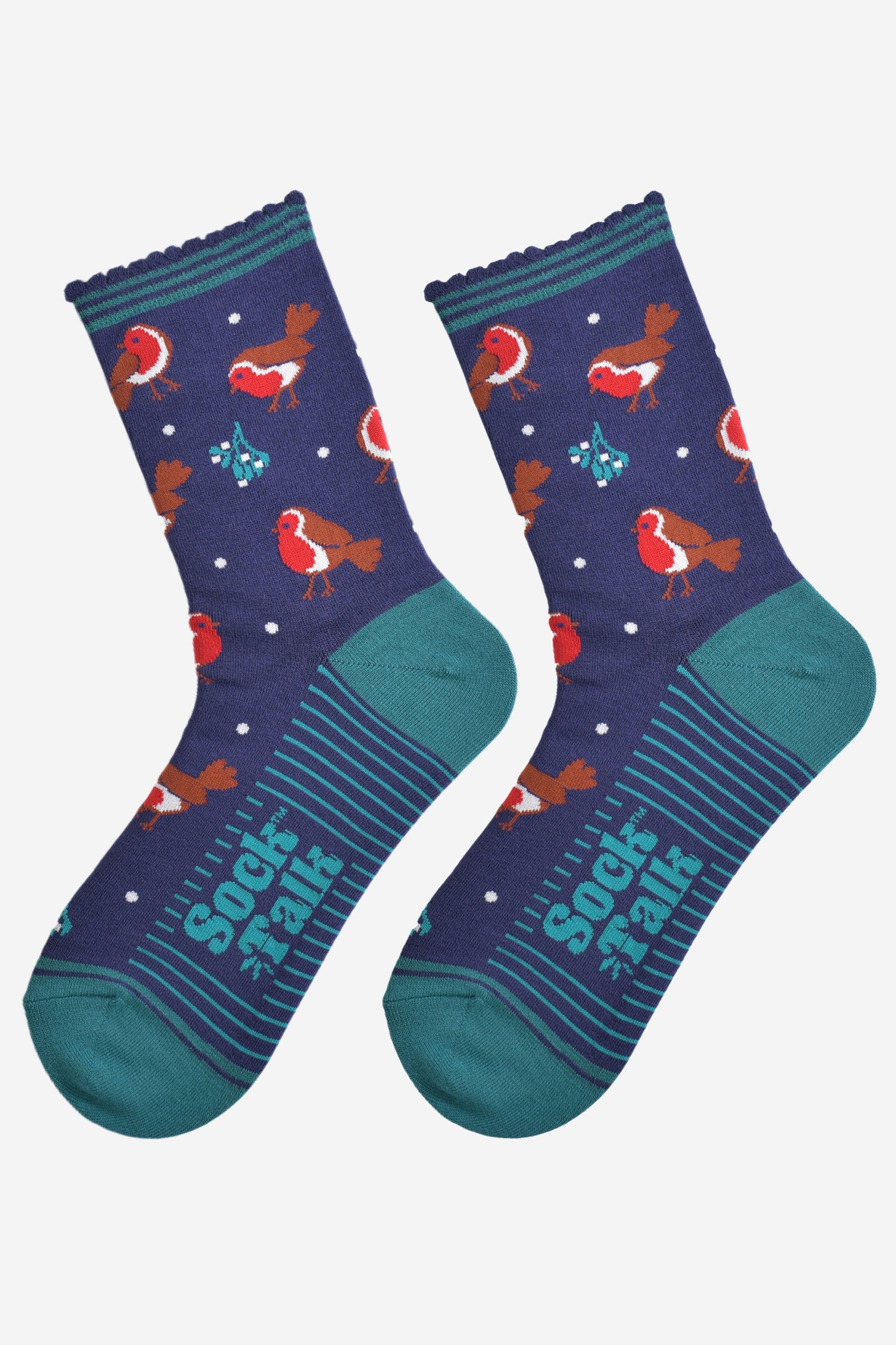 navy blue and red christmas robin bamboo socks laying flat, showing the all over pattern of red robin birds and festive mistletoe