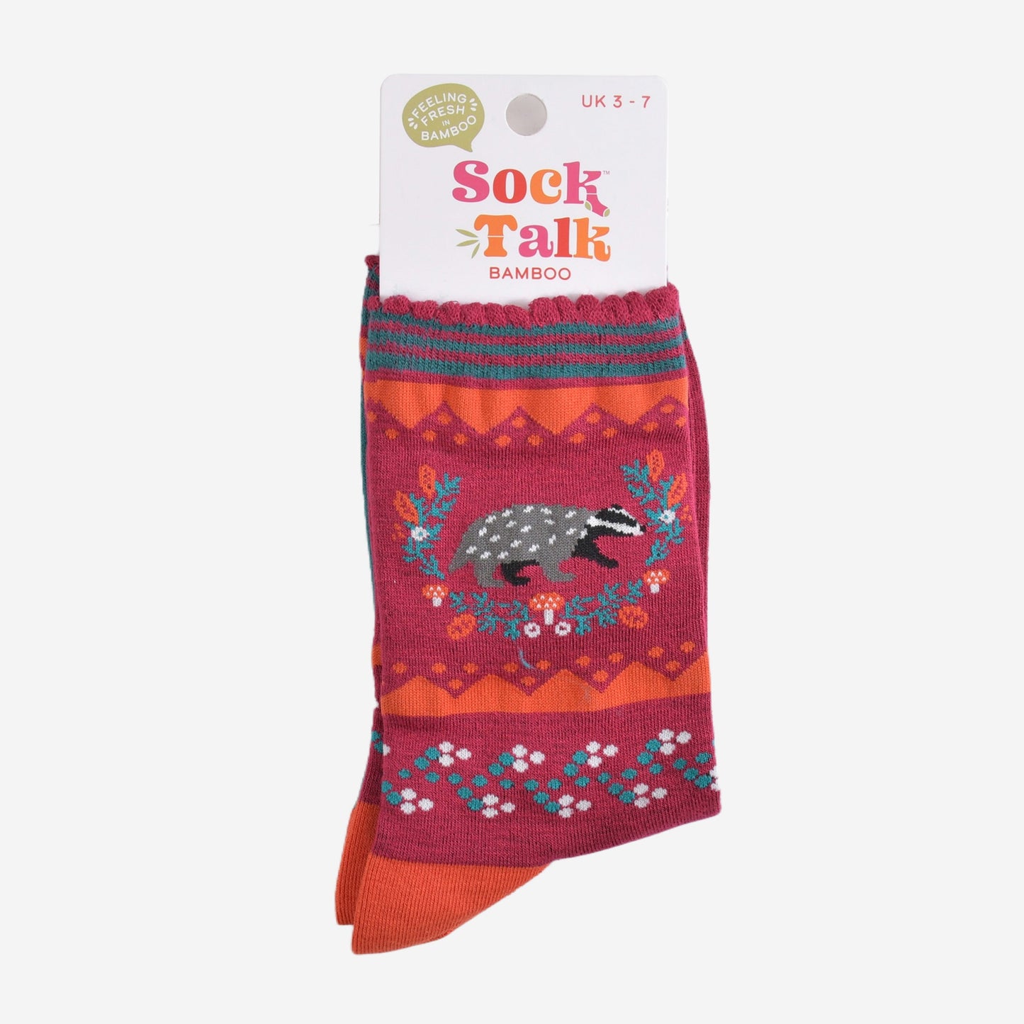 badger wreath bamboo socks in their sock talk packaging, these socks are a uk size 3-7