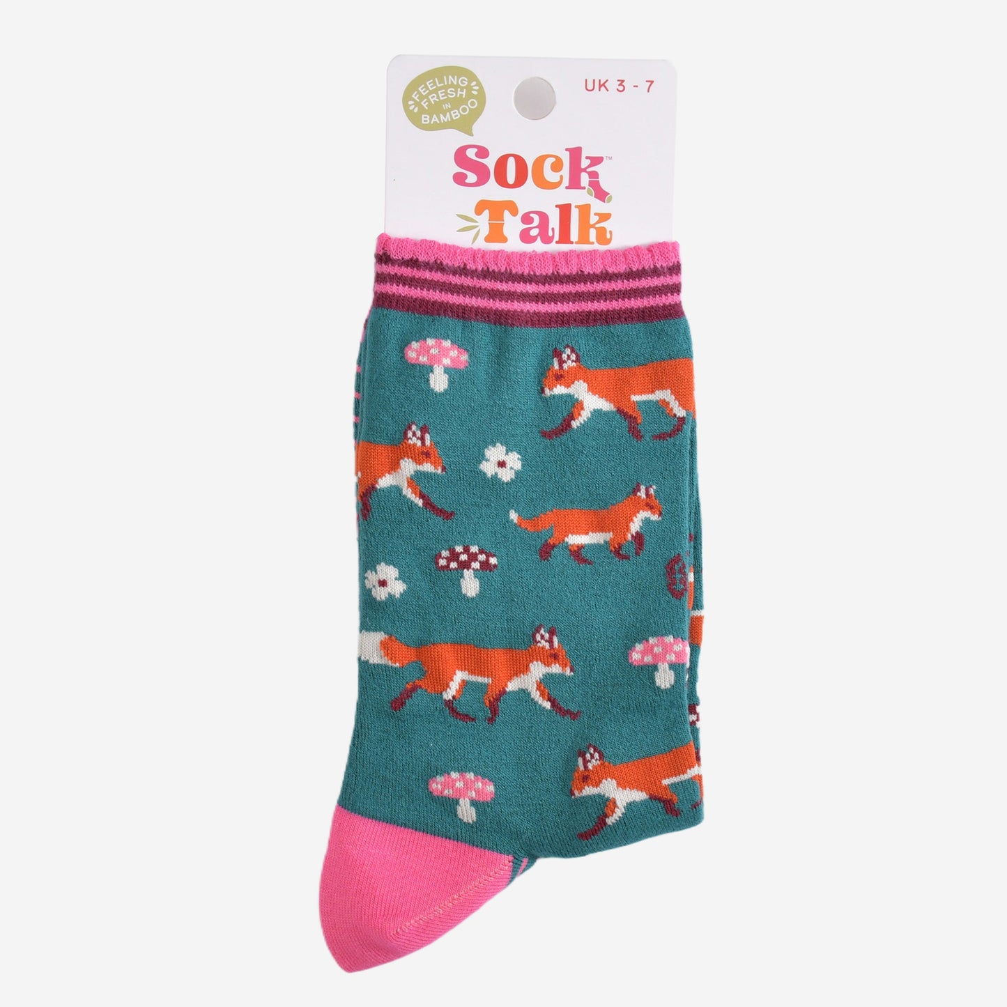 green and pink woodland fox bamboo socks in their sock talk packaging, the socks are a uk size 3-7