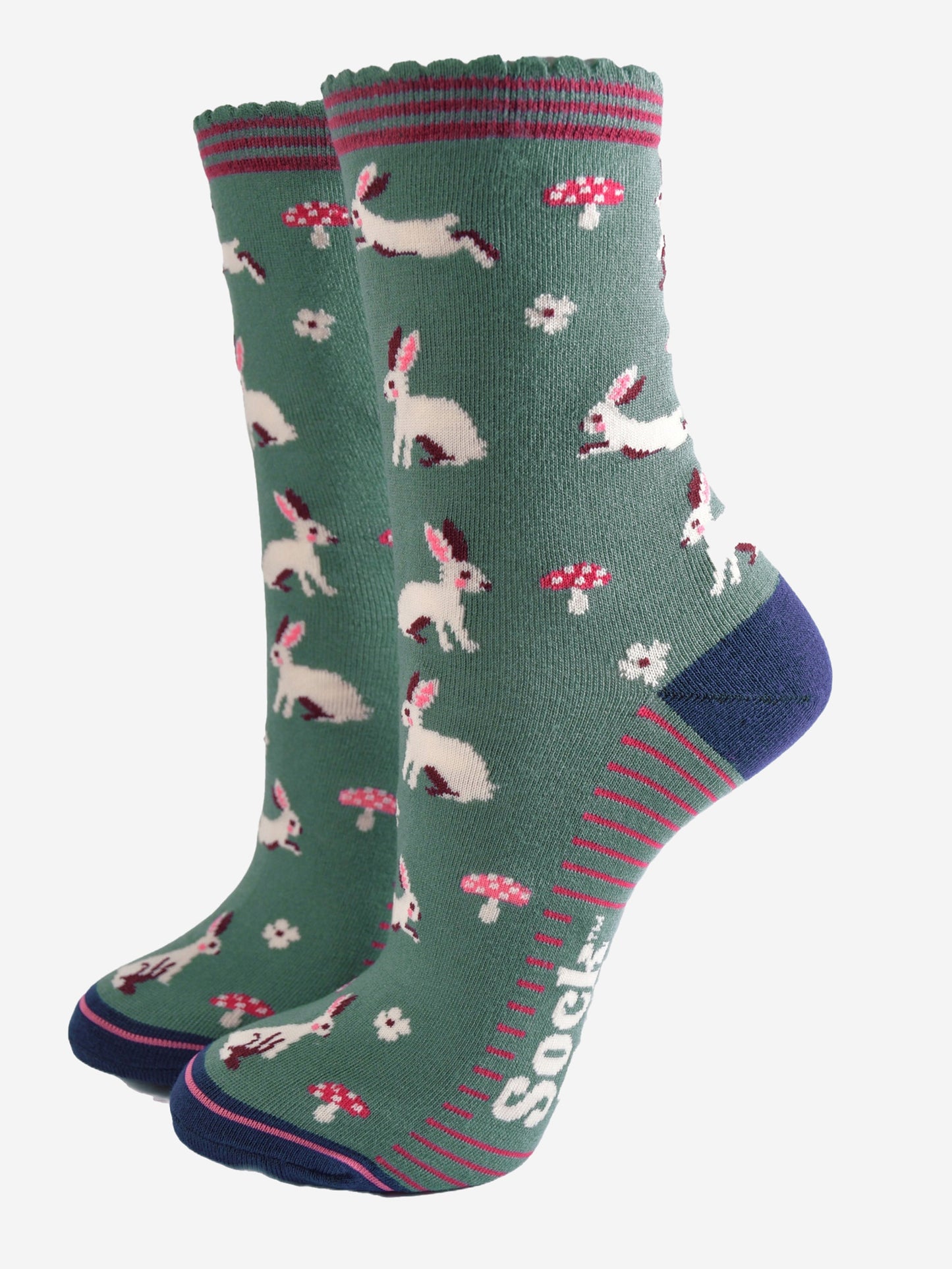sage green ankle socks with a pattern of white rabbits and pink toadstools