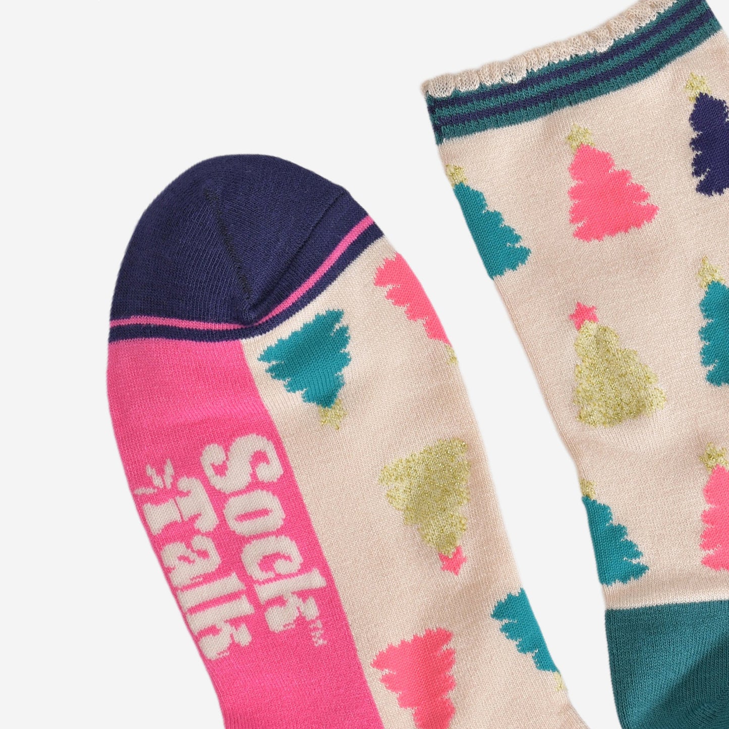 close up of the toe and cuff, the toe is navy blue with a hot pink border stripe, the cuff is scalloped and is cream with a navy and green striped trim