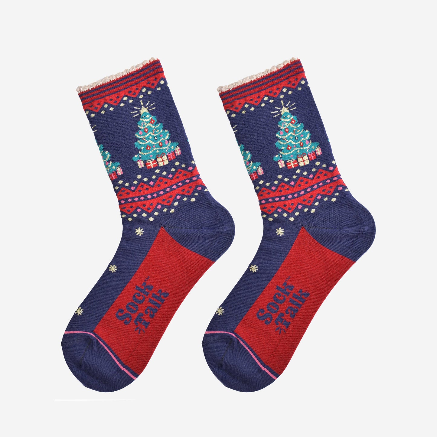 showing the christmas tree socks laying flat, they have a red sole, gold stars and a classic green christmas tree surronded by gifts on the ankle of the socks