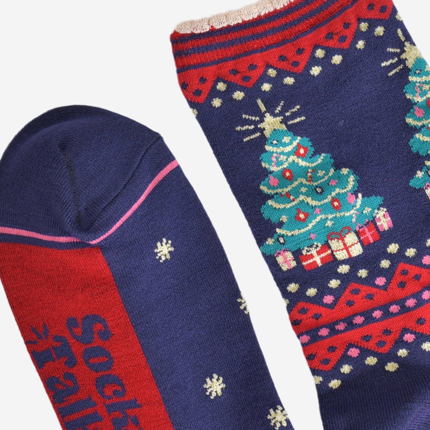 close up of the toe and cuff, the toe is navy blue a hot pink contrasting border stripe, the cuffs are scalloped and are red and navy blue striped