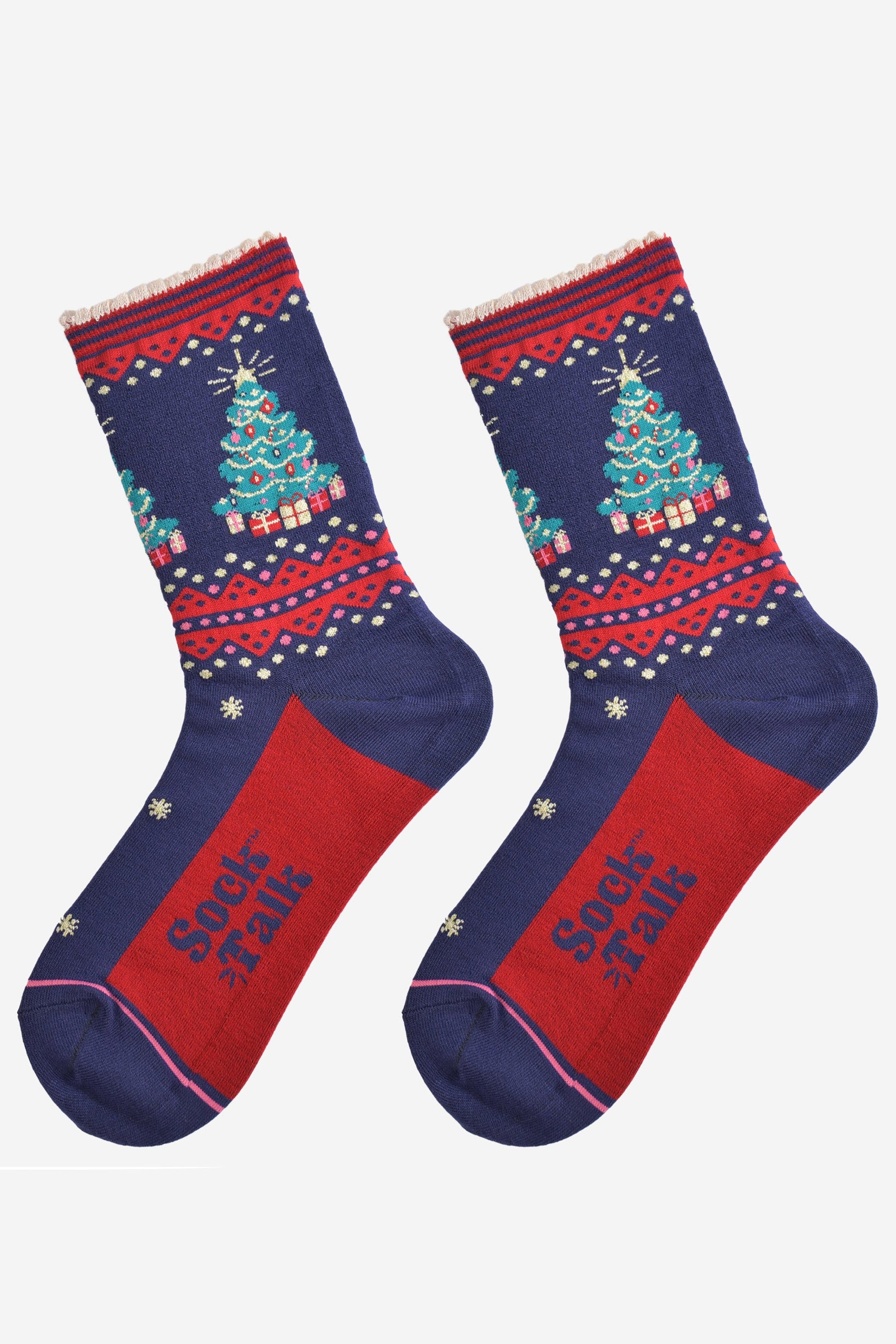 showing the christmas tree socks laying flat, they have a red sole, gold stars and a classic green christmas tree surronded by gifts on the ankle of the socks