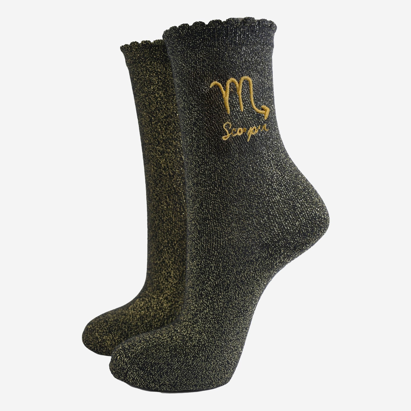 black and gold sparkly ankle socks with a scalloped cuff and an gold embroidered scorpio zodiac symbol and name