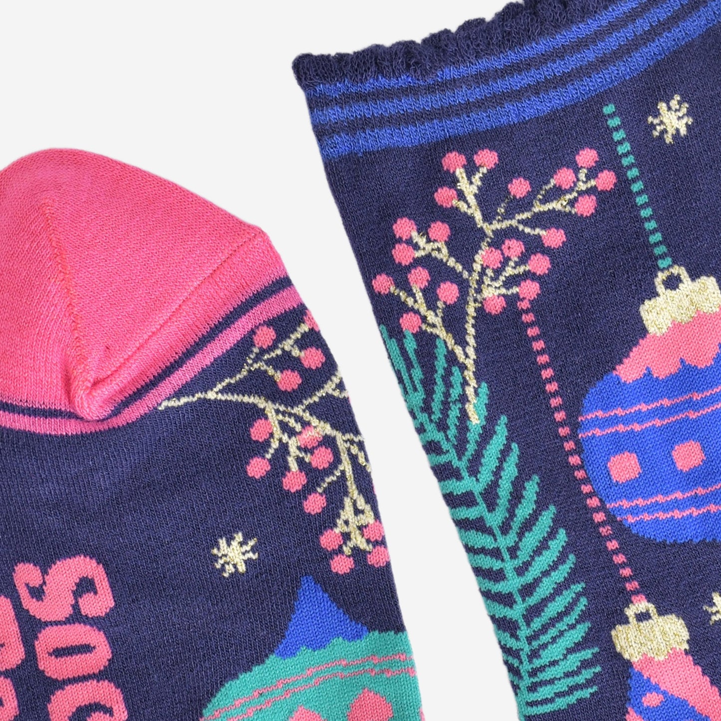 close up of the toe and cuff, the toe is pink, the cuff is scalloped with blue stripes