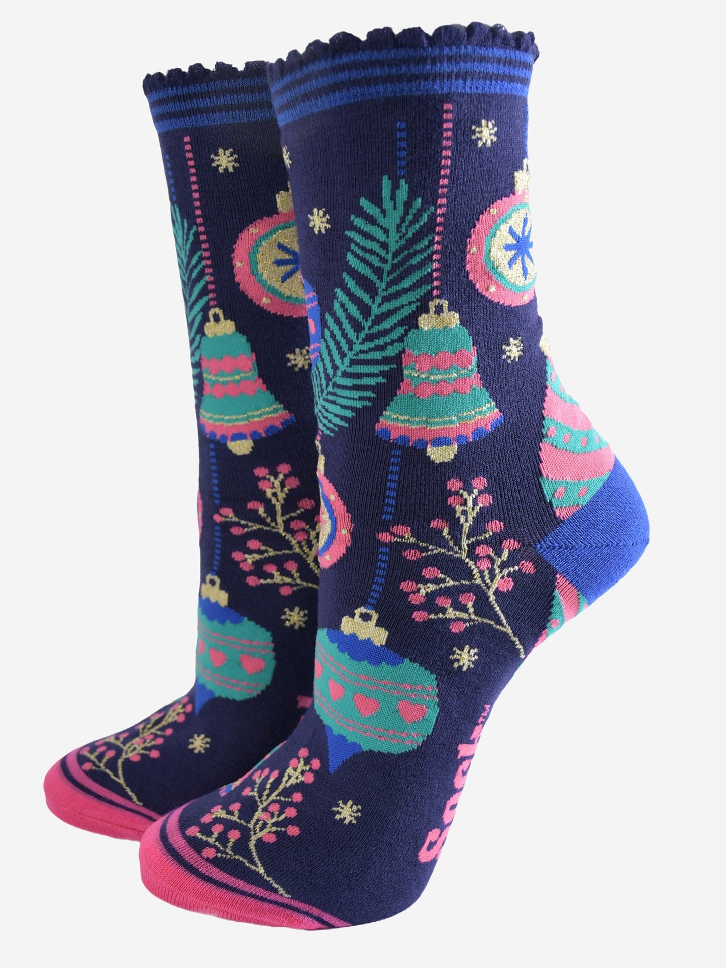 navy blue socks with colourful christmas tree baubles and bells, pink berries and gold starbursts.