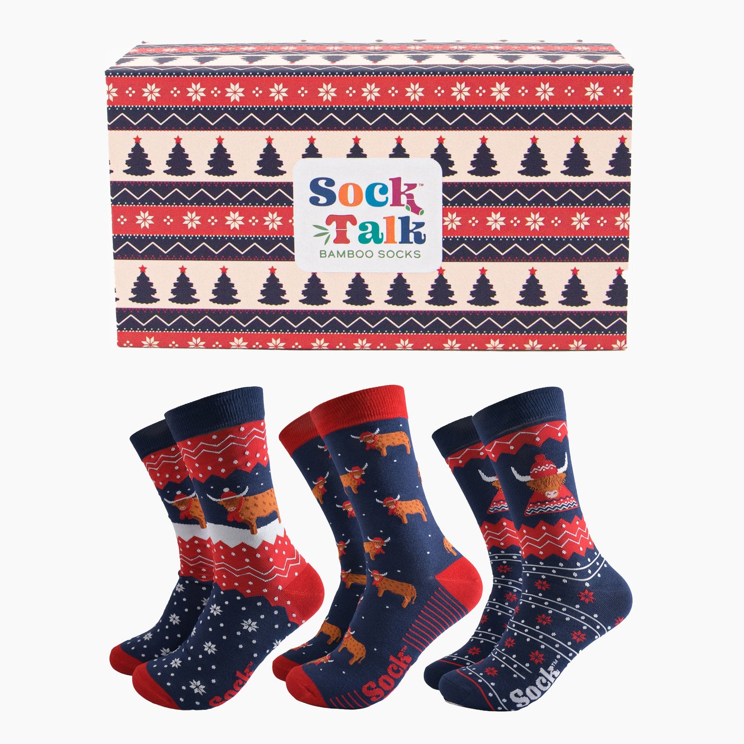 red, blue and cream fair isle style sock gift box with three pairs of festive themed highland cow socks