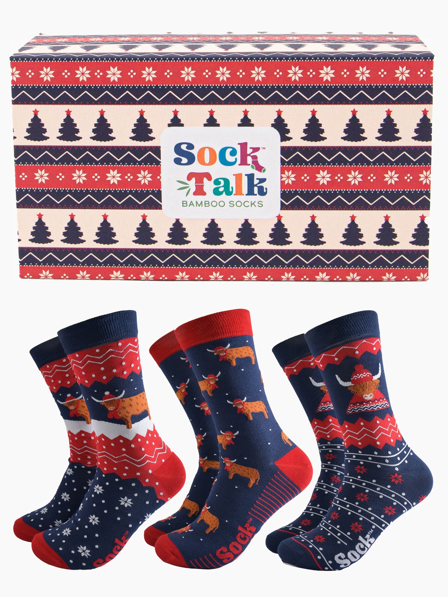red, blue and cream fair isle style sock gift box with three pairs of festive themed highland cow socks