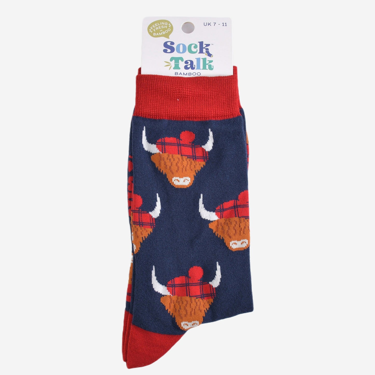 red and navy blue highland cow socks with their sock talk packaging, these socks are uk size 7-11