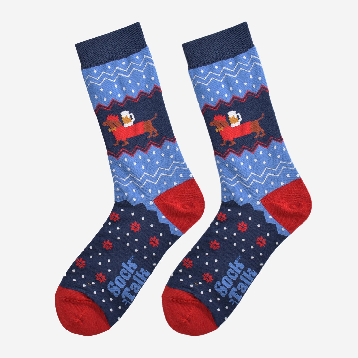 sausage dog beer socks laying flat, showing the blue and red fair isle pattern and the sausage dog carrying a pint of beer on its back