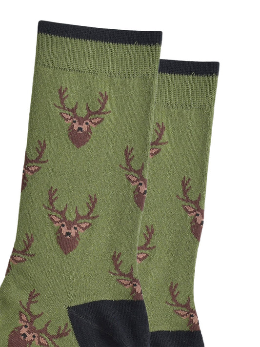 green socks with black heel, toe and cuff with an all over pattern of brown stags heads.