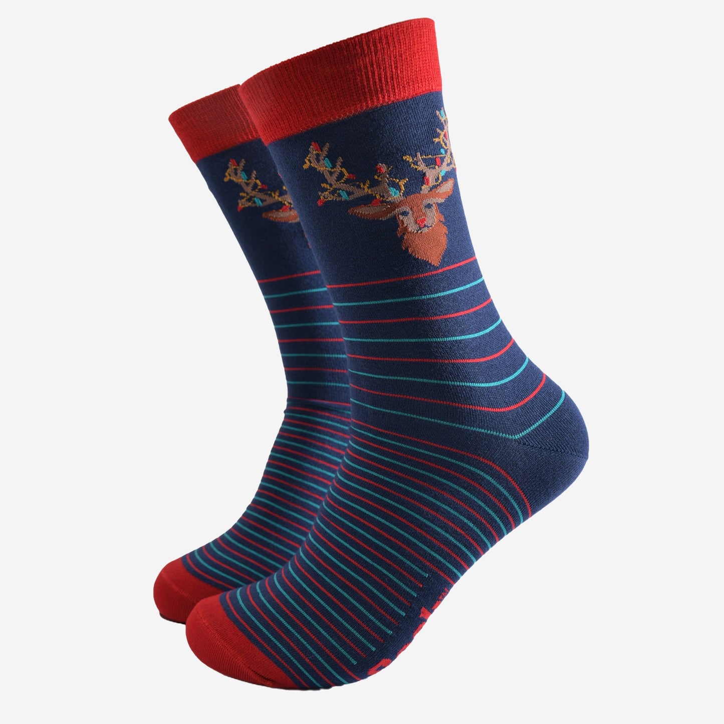 navy blue socks with a red cuff and toe with a red and green horizontal striped pattern with a stags head on the ankle, the stag is draped with colourful party lights