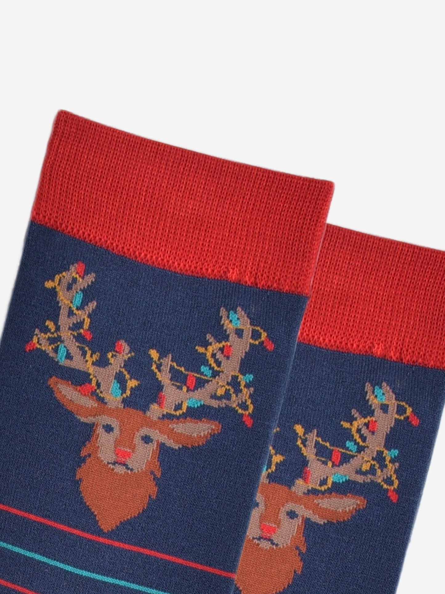 close up of the stag head design on the ankle of the socks, showing the festive party lights entangled in its antlers