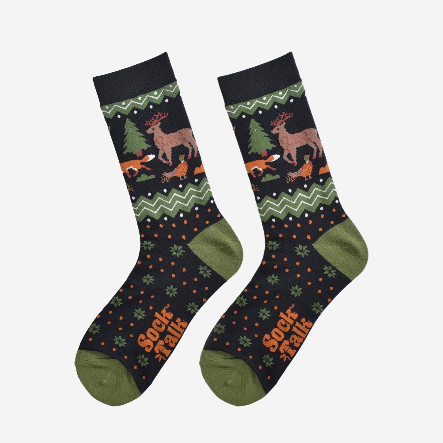 woodland animal bamboo socks laying flat, showing the fair isle pattern and the stag, fox, pheasant and tree pattern on the ankles