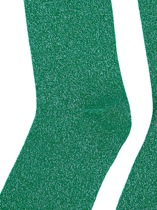close up of the silver sparkle on these green knee high socks