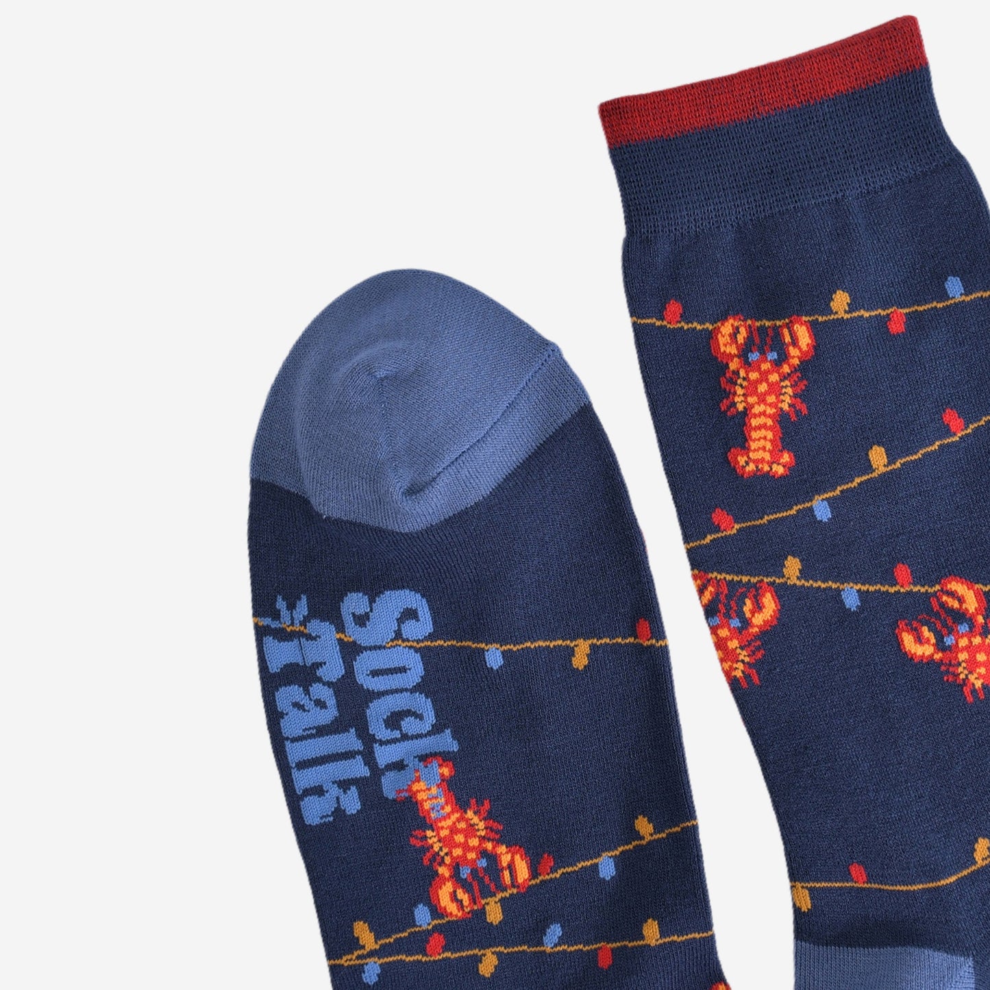 showing the toe and cuff of socks, the cuff has a small contrasting burgundy stripe, the toe is light blue