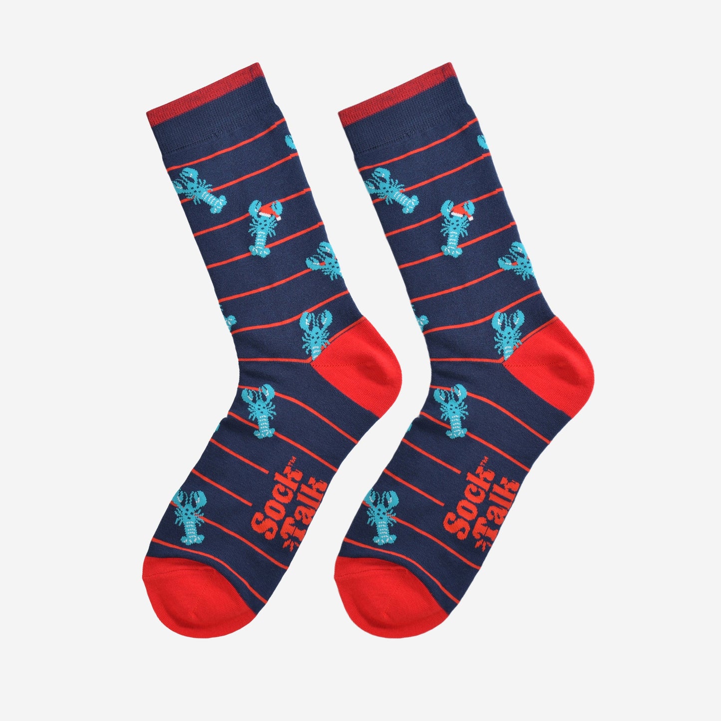 blue lobster socks laying flat, showing the red horizontal pinstripe pattern and blue lobsters wearing santa hats