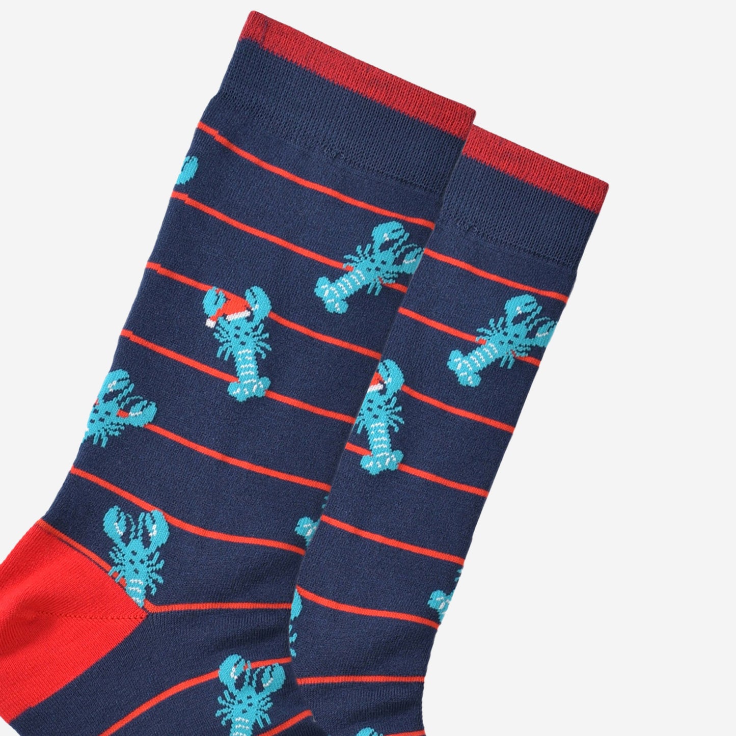 close up of the lobster pattern showing clearly the blue lobsters wearing festive santa hats