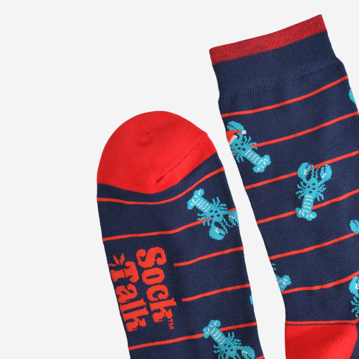 showing the cuff and the toe of the socks, the toe is red and the cuff has a red stripe