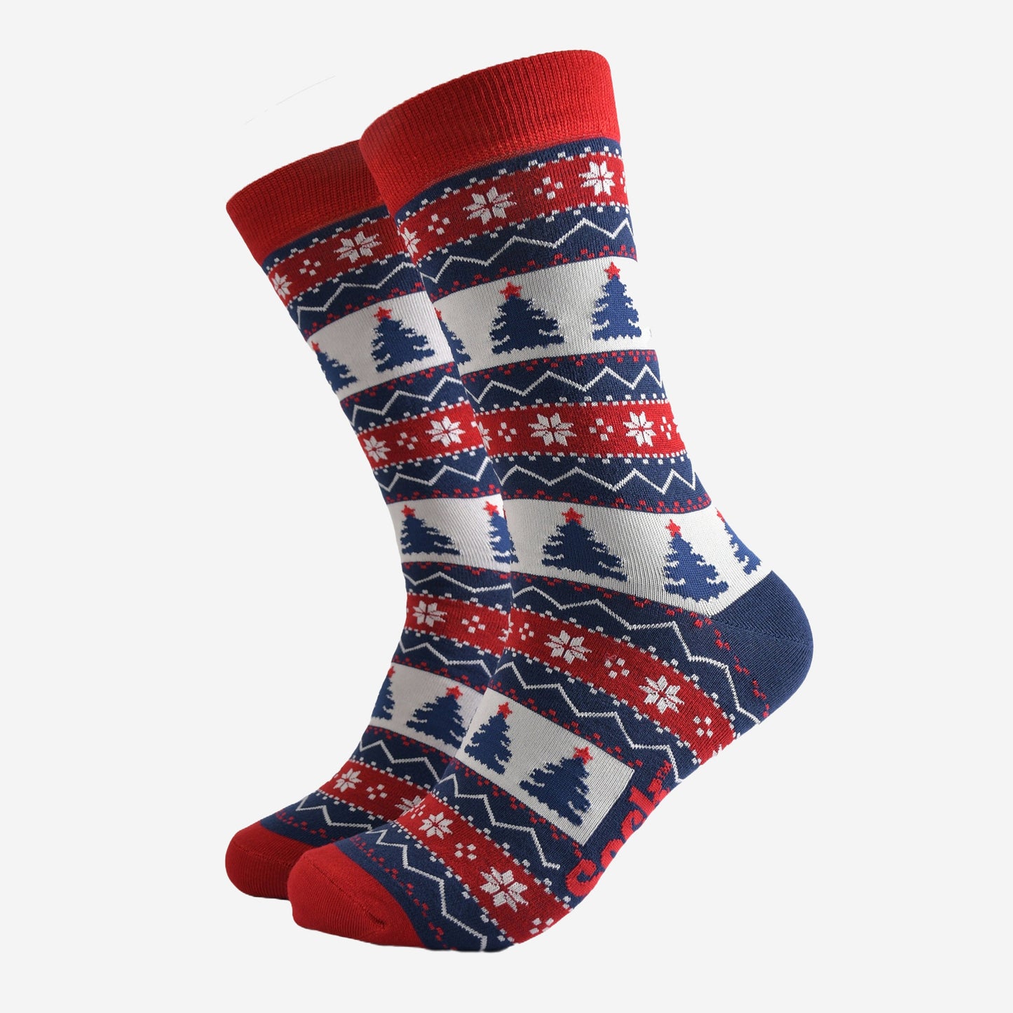red, blue and white fair isle pattern crew socks featuring xmas trees and snowflakes in the design