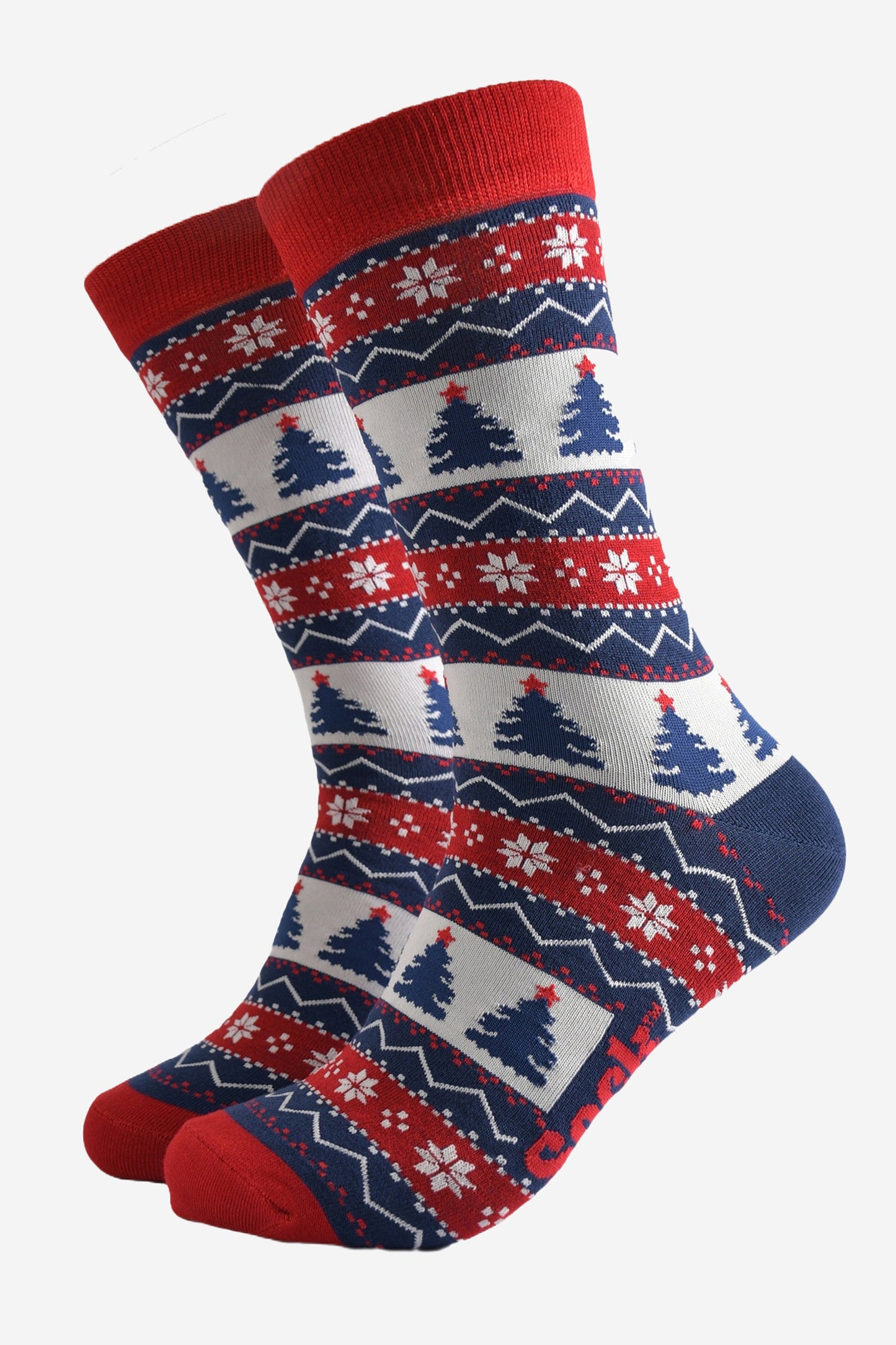 red, blue and white fair isle pattern crew socks featuring xmas trees and snowflakes in the design