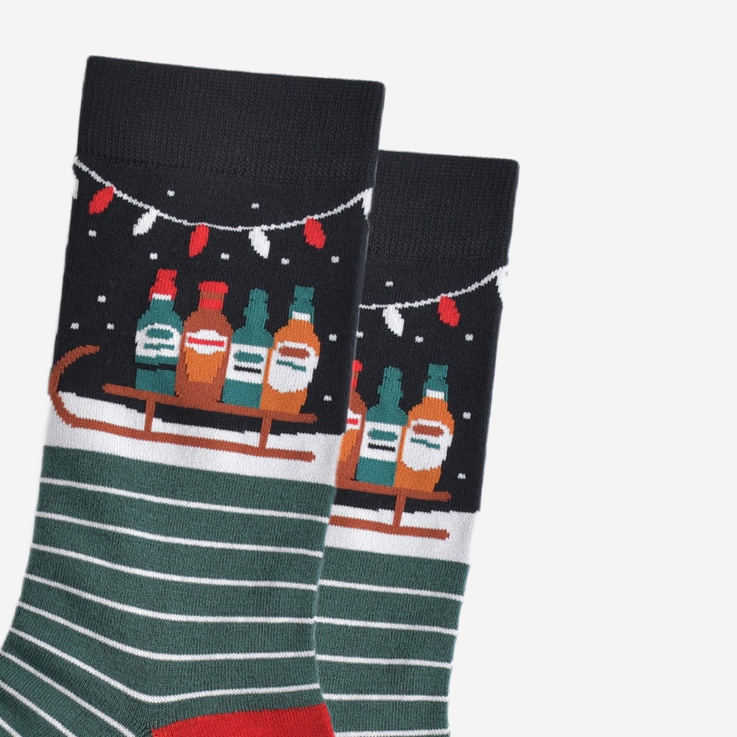 close up of the ankle of the socks, showing clearly the sledge and drinks