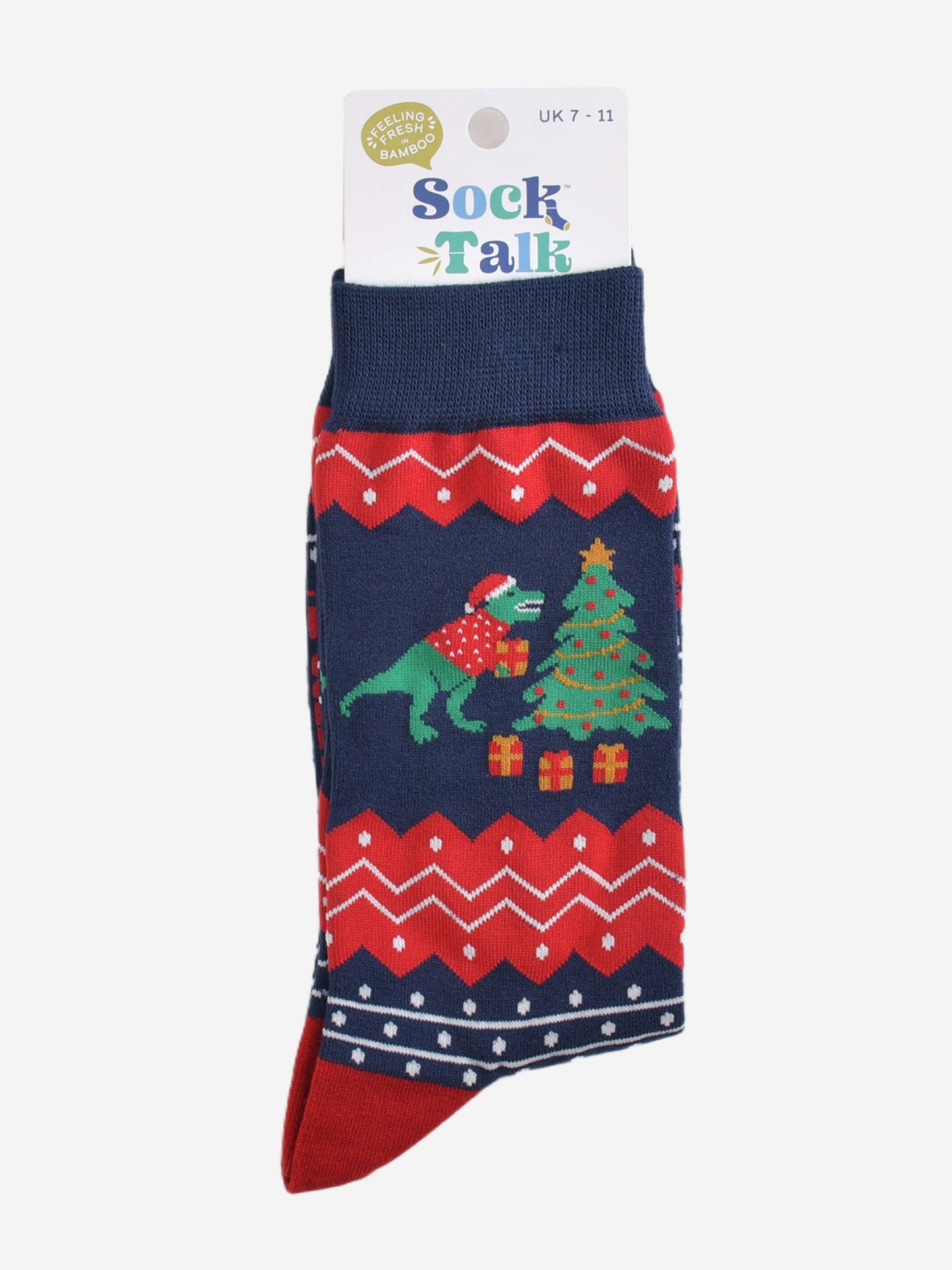 t-rex christmas tree socks in their sock talk packaging, the socks are a uk size 7-11