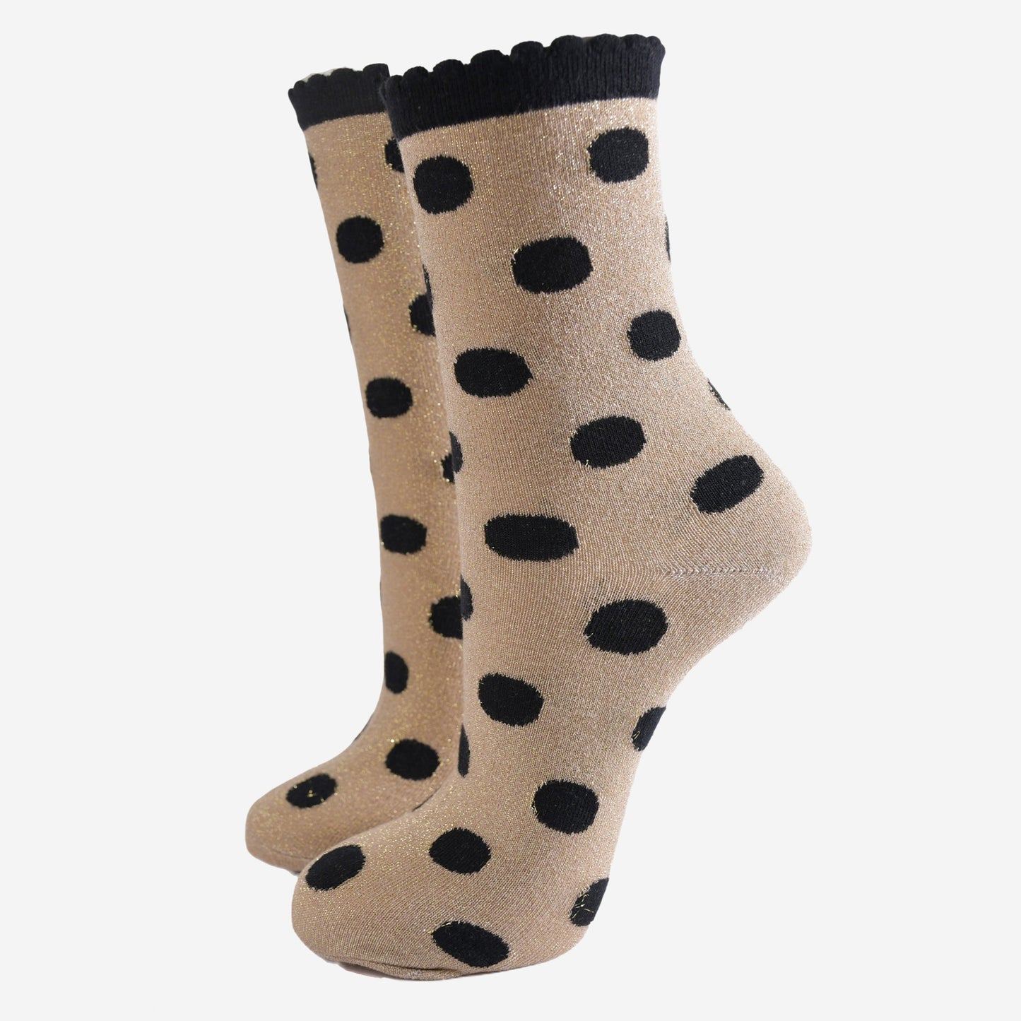 gold ankle socks with an all over black polka dot pattern