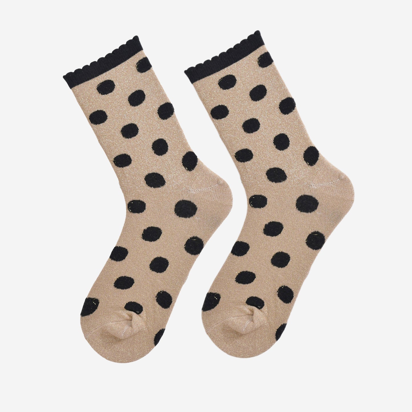 showing the gold and black polka dot socks laying flat, the silver glitter sparkle is visible and the black polka dot pattern is all over the design