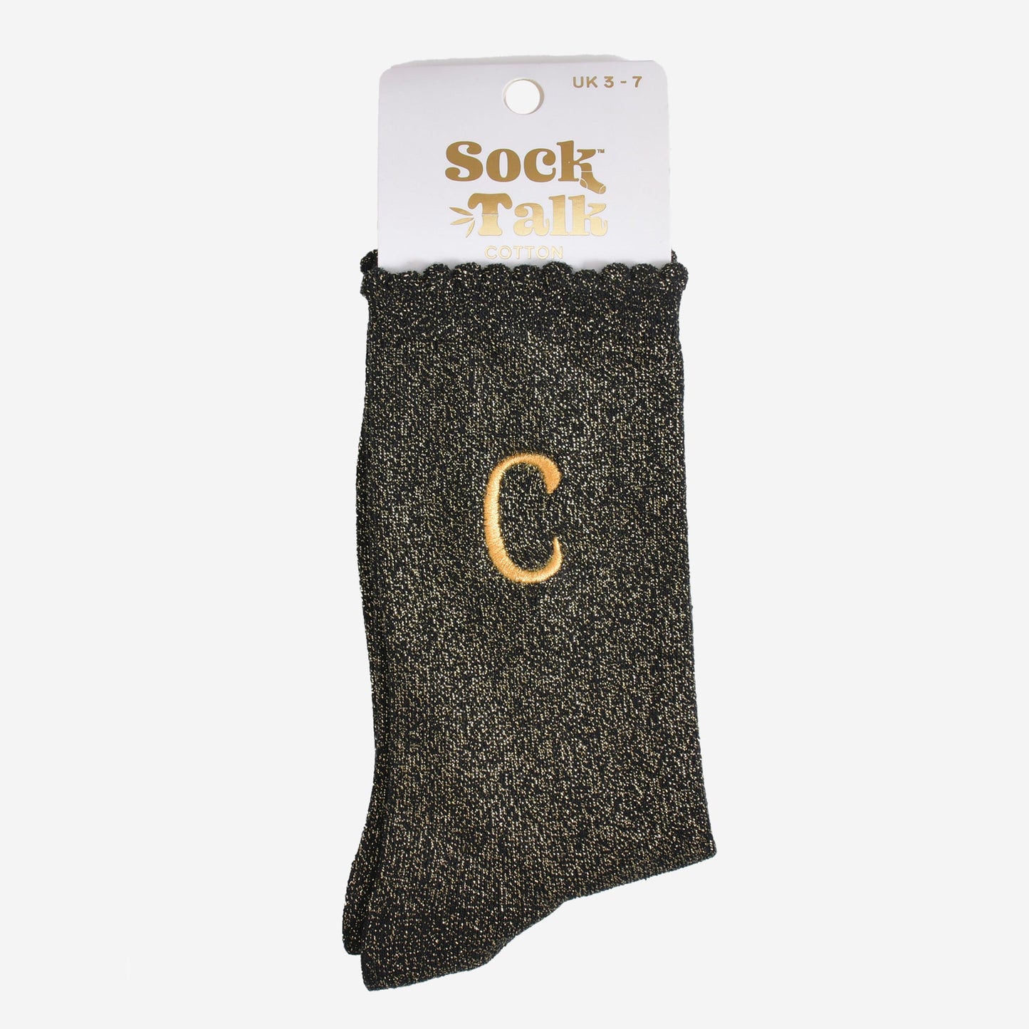 embroidered glitter letter c cotton ankle socks in their sock talk packaging, the socks are a uk size 3-7