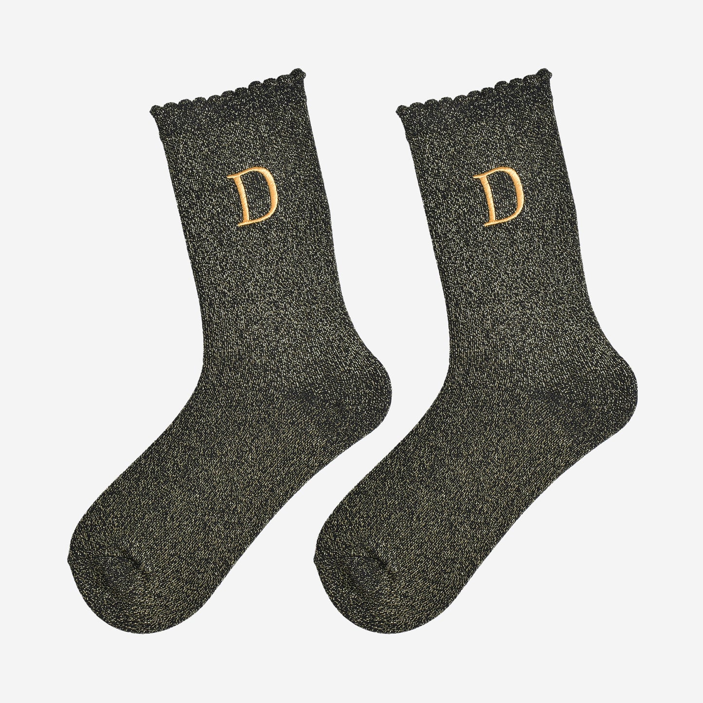 showing the glitter socks laying flat, they have a scalloped cuff and an all over gold sparkle