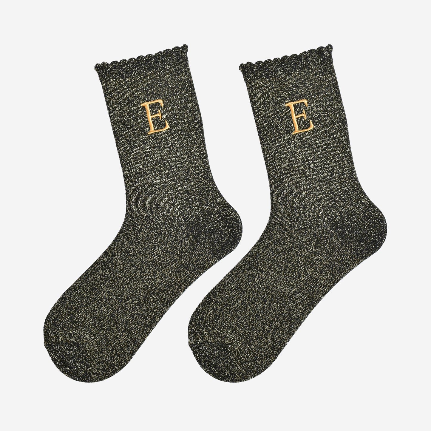 showing the glitter socks laying flat, they have a scalloped cuff and an all over gold sparkle