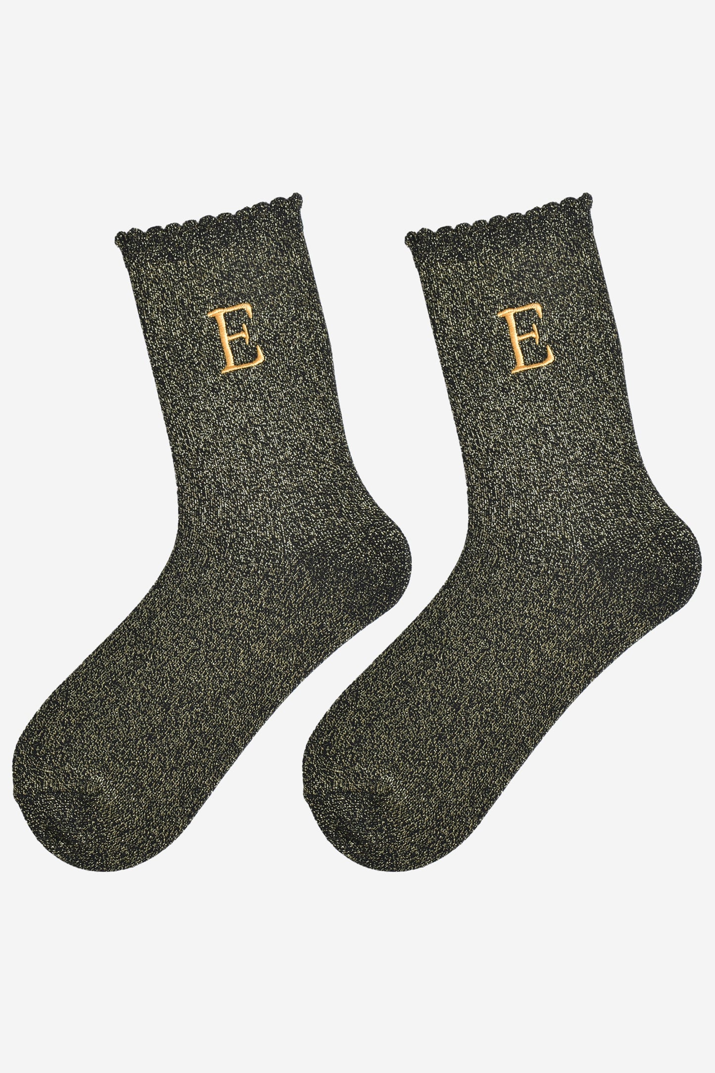 showing the glitter socks laying flat, they have a scalloped cuff and an all over gold sparkle